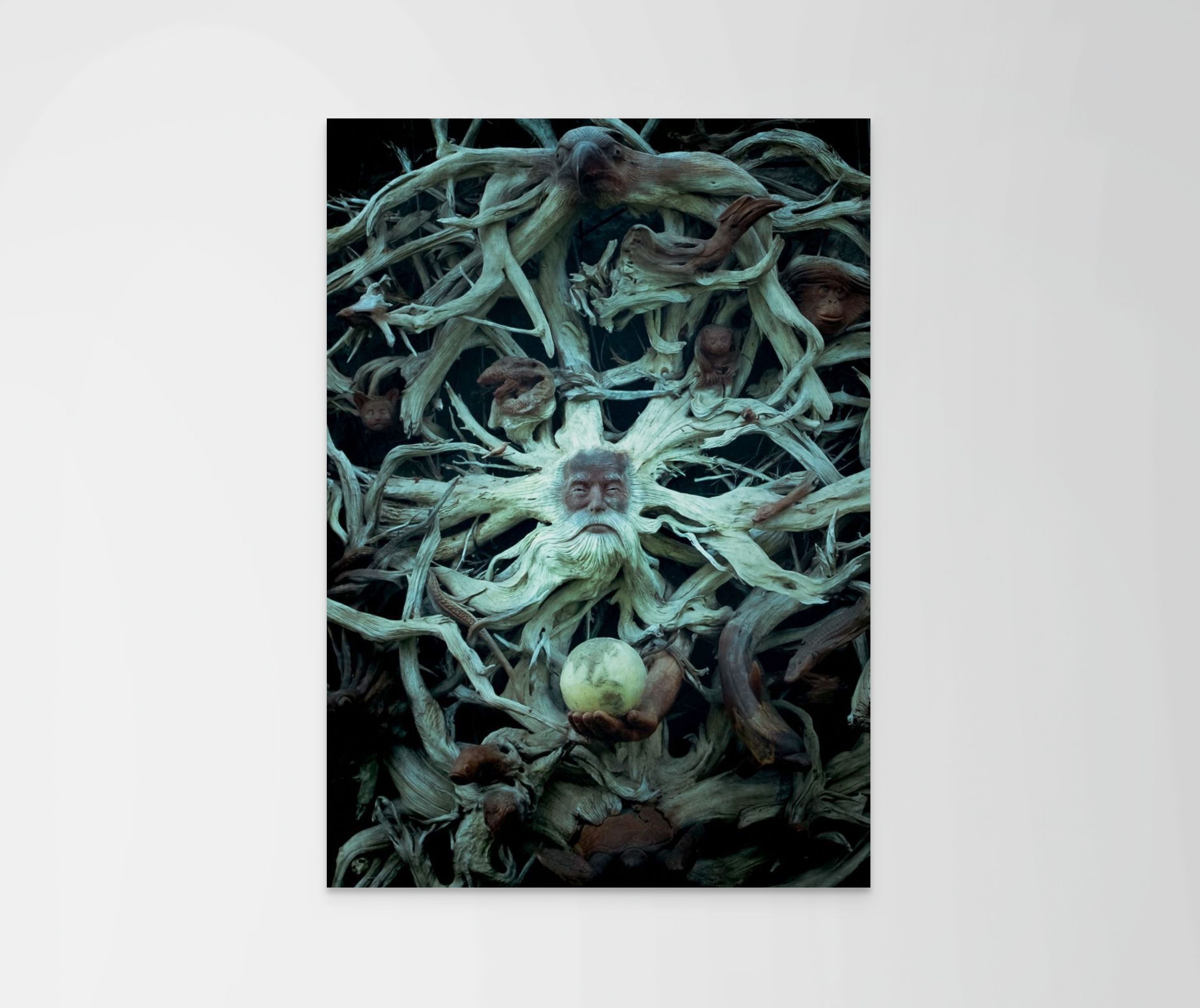 Artistic depiction of a central figure surrounded by intricate patterns on a white background